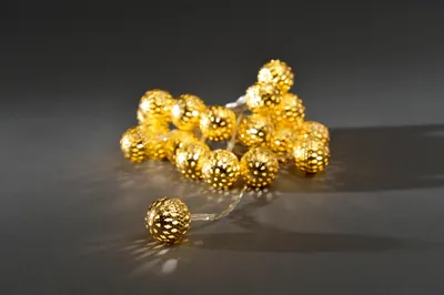 Produktbild von Konstsmide - LED Dekolichterkette, kleine goldfarbene Metallbälle, 20 warm weiße Dioden, batteriebetrieben, Innen, transparentes Kabel, 3 x AA 1.5V (exkl.); 3158-803