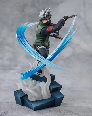 A collectible figure of Kakashi Hatake from Naruto Shippuden in a dynamic pose with water effects.