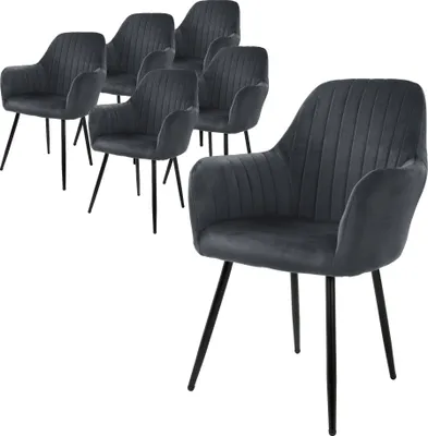 A set of six gray velvet dining chairs with black legs, arranged in two groups.