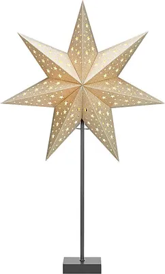 A gold star-shaped lamp on a stand.