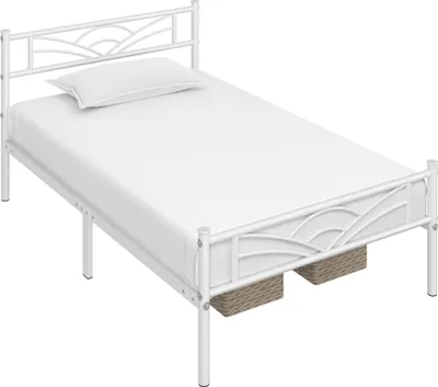 A white metal bed frame with a mattress and pillow, shown from a diagonal angle.