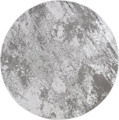 A round rug with a distressed, abstract pattern in shades of gray and white.