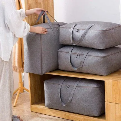 Zdjęcie produktu dla Torba do przechowywania koców lub ubrań marki Famanu – niebieska, 2 sztuki, 70 x 50 x 30 cm