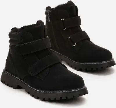 A pair of black winter boots for children.