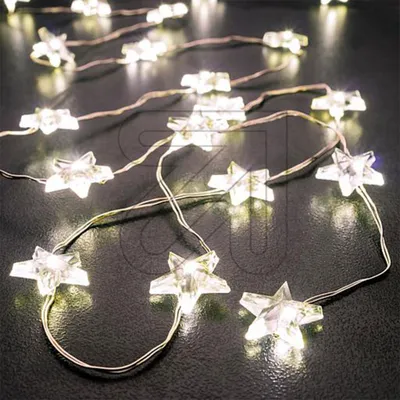A string of star-shaped LED lights on a dark surface.