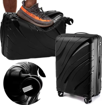A collage of images showing a black suitcase with a unique wavy pattern, a close-up of its wheels, and a shoe placed on top of it.