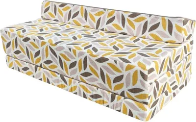 A folded mattress or sofa bed with a leaf-like pattern.