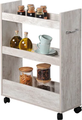 A white washed wooden rolling shelf unit filled with kitchen items like spices, olive oil, pasta, and cups.