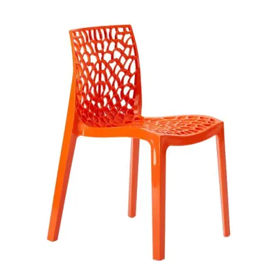 An orange plastic chair with a unique, web-like design on the back and seat, shown against a white background.