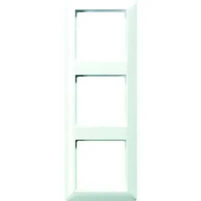 A white, three-gang switch frame is shown against a white background.