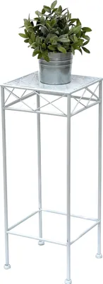 A white metal plant stand with a potted plant on top.