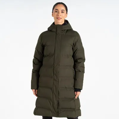 A woman wearing a green winter coat against a white background.
