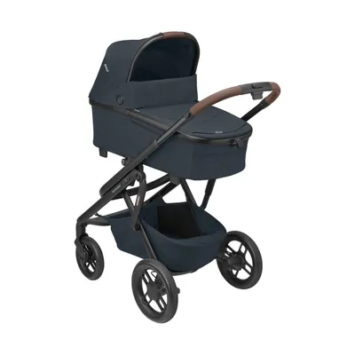 Zdjęcie produktu dla Wózek dziecięcy Maxi-Cosi Lila XP Plus, przeznaczony dla dzieci w wieku 0-4 lata, idealny do jazdy po nierównym terenie, wyposażony w przestronną gondolę z dodatkowo wyściełanym materacem i funkcją bujania, kolor: grafit