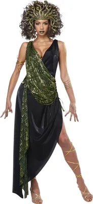 A woman is posing in a Medusa costume against a white background.