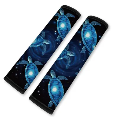 Image de 2 coussinets de protection pour ceintures de sécurité, motifs néon : galaxie, tortue marine, en néoprène, dimensions 28x6 cm