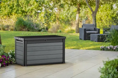 Productafbeelding van Buitenopslagkist van het merk Baule, afmetingen 122,9 x 62,1 x 70,6 cm, model Evotech Keter Cortina Box 100G, kleur grijs