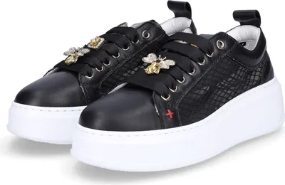 Produktbild von Damen Sneaker aus Leder in Schwarz mit Plateausohle und Wechselfußbett