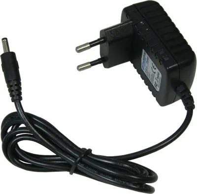 A black power adapter with a European plug and a DC output cable.