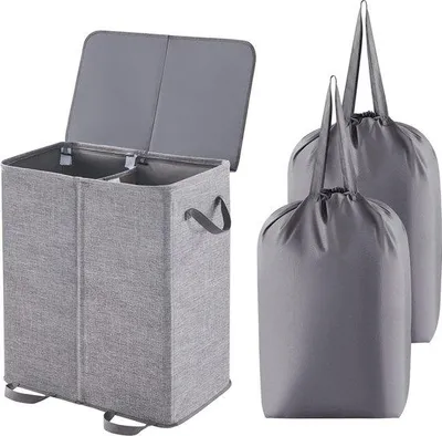 Immagine prodotto di Cesto per biancheria Unyqoos® da 136 litri con coperchio – 2 scomparti e 2 sacchi per biancheria estraibili, divisore per biancheria pieghevole in tessuto, dimensioni 60x35x65 cm, colore grigio