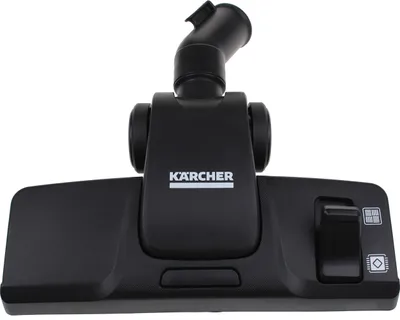 A close-up studio shot of a black vacuum cleaner floor head.