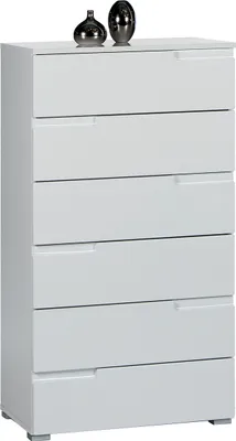 A white chest of drawers with two decorative vases on top.
