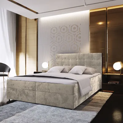 A luxurious bedroom with a large bed, bedside tables, and lamps.