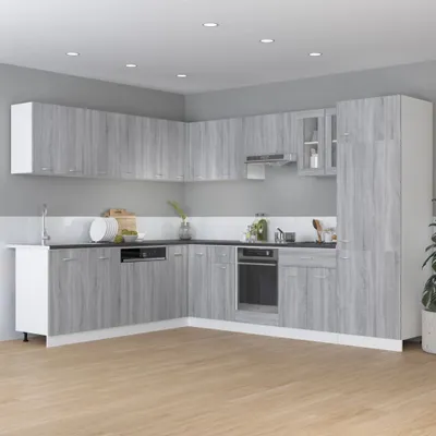 A modern kitchen with grey wood-effect cabinets and appliances.