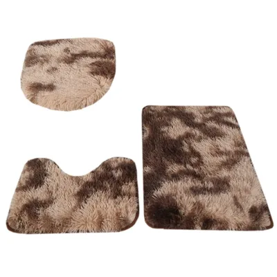 Three fluffy bath mats with a brown and beige marbled pattern are arranged on a white background.