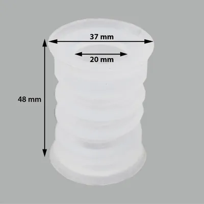 A white, ribbed cylindrical object with measurement indicators.