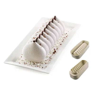 A dessert on a white platter next to two silicone molds.