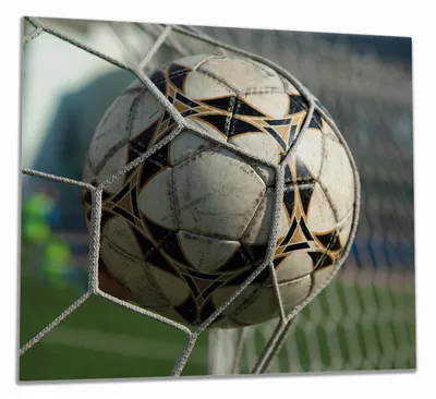 Produktbild von Wallario Herdabdeckplatte aus Glas, Größe 60 x 52 cm 1-teilig, Motiv Fußball - Ball im Tor - Bolzplatz