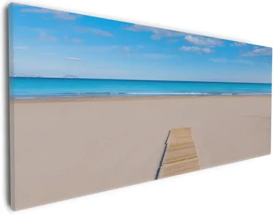 Produktbild von Wallario Premium Leinwandbild Auf dem Holzweg zum blauen Meer in Größe 30 x 75 cm