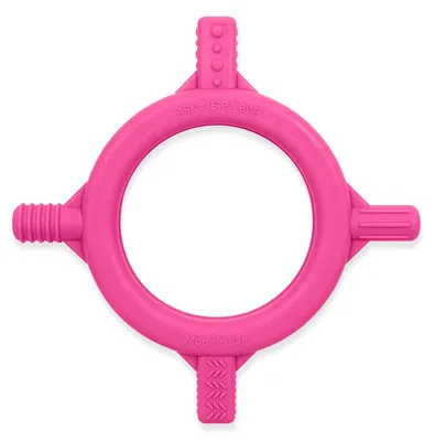 Imagen del producto de ARK Therapeutic: Juguete para morder para bebés, modelo Tetra-Bite, color rosa. Hecho de plástico resistente, es una herramienta para que los bebés y niños pequeños mastiquen, estimulando la motricidad oral y el desarrollo sensorial.