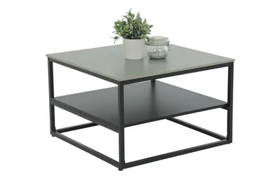 A square coffee table with two shelves, a plant, and a jar on top, set against a white background.
