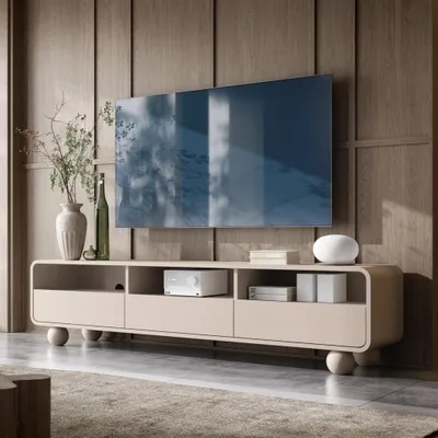 Produktbild von Orion TV-Lowboard 180 cm in Kaschmir mit drei Schubladen, offenen Fächern und abgerundeten Seiten auf kugelförmigen Füßen – elegantes und praktisches Möbelstück für das Wohnzimmer