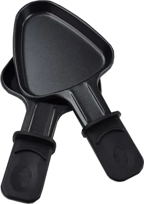Two black raclette pans are shown against a white background.
