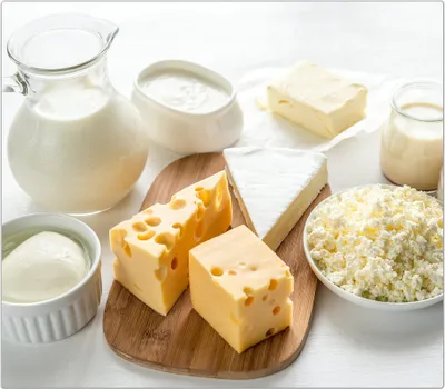 Produktbild von Spritzschutz Herdabdeckplatte Schneidebrett aus Glas Käse und Milch 1-Teilig (60x52cm)