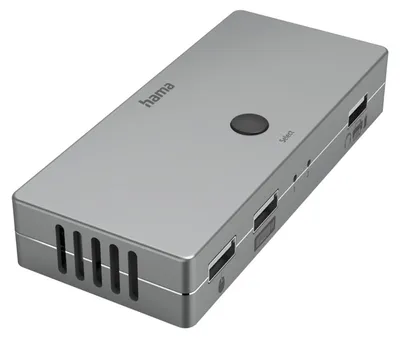 A product shot of a silver KVM switch on a light gray background.
