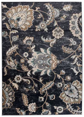 A close-up view of a dark-colored rug with a floral pattern.