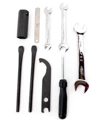 A collection of tools laid out on a white background.