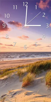 Produktbild von Wallario Design Wanduhr bedruckt, Größe 30 x 60 cm, Motiv: Abendspaziergang am Strand - Sonnenuntergang über dem Meer