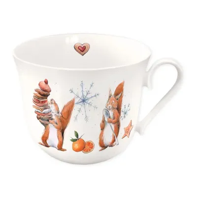 A white ceramic mug with a Christmas-themed illustration of two squirrels, snowflakes, and oranges.