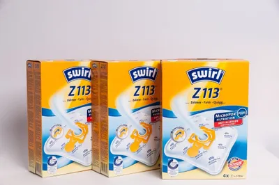 Three boxes of Swirl Z113 vacuum cleaner bags are displayed against a white background.