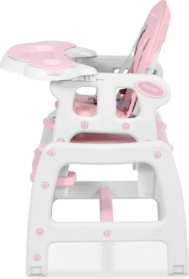 A side view of a pink and white baby high chair.