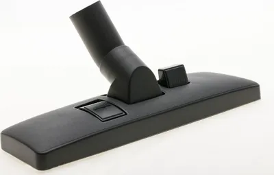 A close-up studio shot of a black vacuum cleaner floor head against a white background.