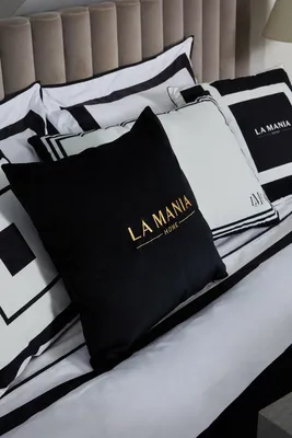 Immagine prodotto di Cuscino nero e oro