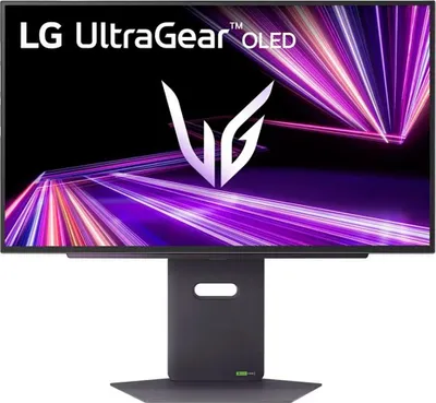 A gaming monitor displaying a vibrant abstract graphic.