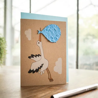 Produktbild von Geburtskarte „Storch, blau“ - Pflanzbare Grußkarte aus Saatpapier mit