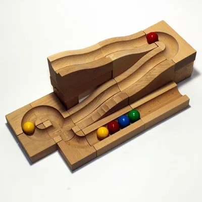 Imagen del producto de Pista de bolas en caja. Dimensiones: 27 cm x 27 cm x 6 cm. Producto nuevo