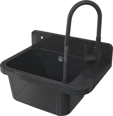 A black speckled sink with a black faucet and water running.